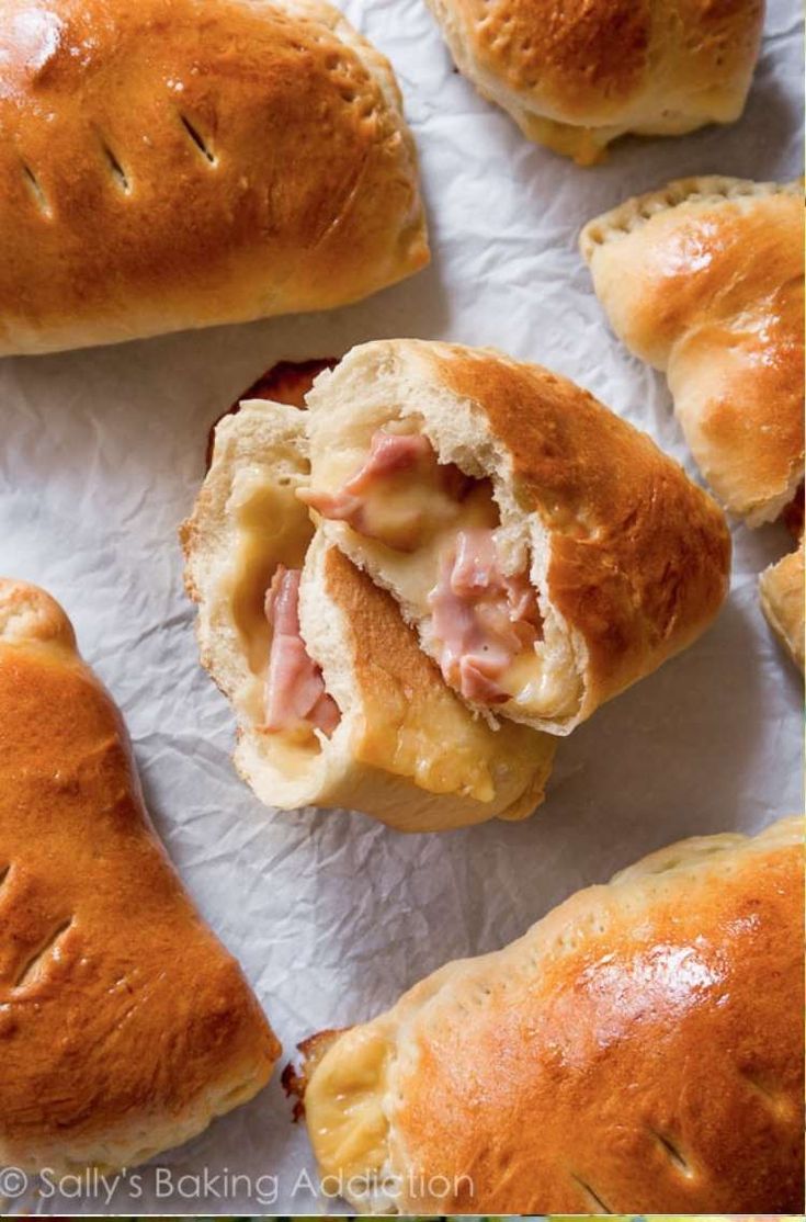 ham and cheese pastry rolls on wax paper