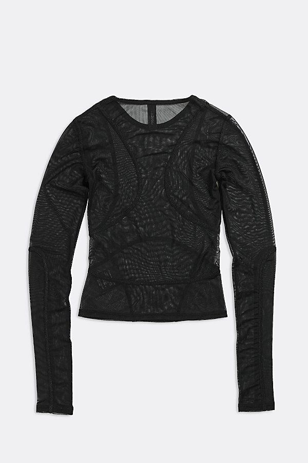 This item is subject to a 15% restocking fee if returned. A sheeru00a0mesh fitted long sleeve top withu00a0contour panels. Whatever your mood, spicy or sporty, wear this top at the gym or a night out on the town. Sheer perfection. u00a0 Content + Care -u00a0Recycled Polyester Wash in cold water, hang dry Hand Made in Los Angelesu00a0 Size -u00a0XS - 2XL One-of-a-Kind Vintage Authentic vintage piece, handpicked from around the world. One-of-a-Kind Vintage styles are singularly circular, extending Fitted Long Sleeve Top With Sheer Sleeves For Fall, Fitted Long Sleeve Mesh Top For Fall, Fall Mesh Top With Sheer Sleeves And Crew Neck, Fitted Mesh Blouse For Fall, Fitted Long Sleeve Blouse With Mesh Sleeves, Nylon Long Sleeve Tops For Fall, Sheer Mesh Long Sleeve Top For Fall, Long Sleeve Nylon Tops For Fall, Long Sleeve Mesh Top For Layering