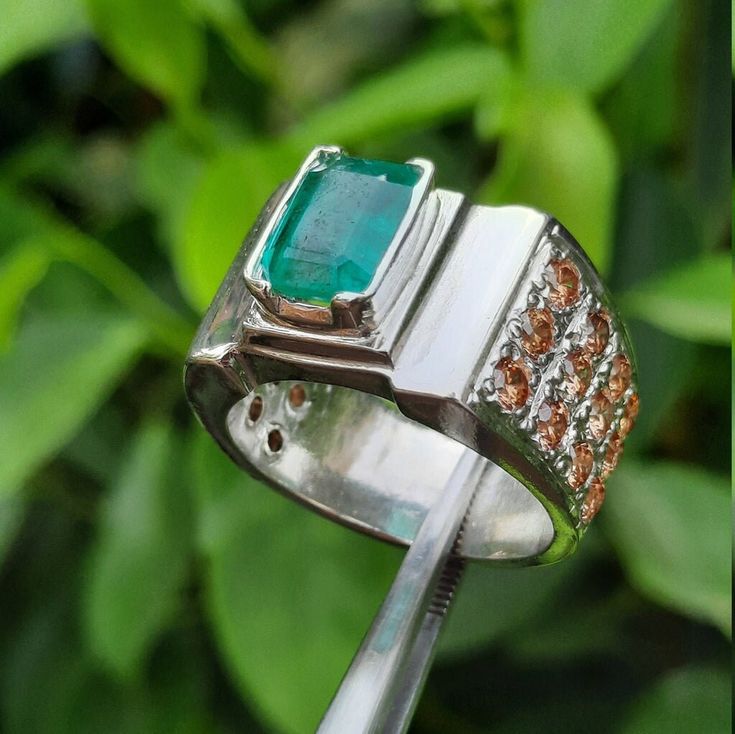 Description: Authentic Mens Emerald Ring - Real Natural Emerald Stone - Original Zamurd Stone - Genuine Swat Emerald Ring - Luxury Mens Fashion Ring Total Carat : 4 Carats Stone Name: Emerald | Zamurd Stone Dimensions : 11.0mm x 7.8mm Stone Shape: Emerald Cut  Ring Sizes: All US, UK International Size Available  Re-sizable: Yes Type: Natural Unheated Untreated Gemstone Shipment Via FedEx Luxury Mens Fashion, Emerald Ring Silver, Emerald Stone Ring, Mens Emerald Rings, Solid Gold Wedding Band, Emerald Stone Rings, Emerald Wedding Rings, Mens Rings Fashion, Carnelian Jewelry