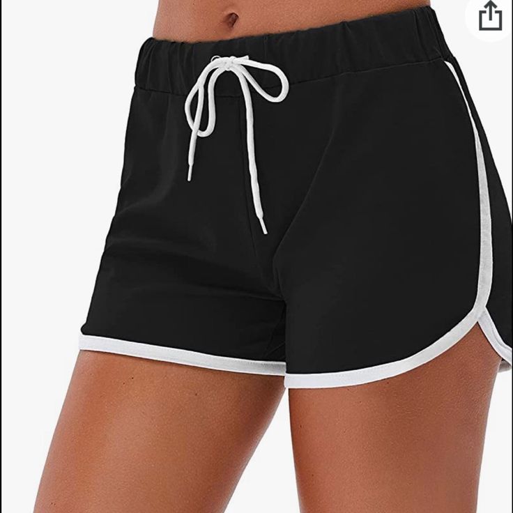 Black Shorts Black Bottoms For Summer Workout, Black Sports Bottoms For Summer, Black Athleisure Bottoms For Summer, Casual Black Beach Bottoms, Stretch Black Shorts For Summer, Black Bottoms With Built-in Shorts For Beach Season, Black Stretch Shorts For Vacation, Black Stretch Shorts For Summer, Drawstring Black Beach Bottoms