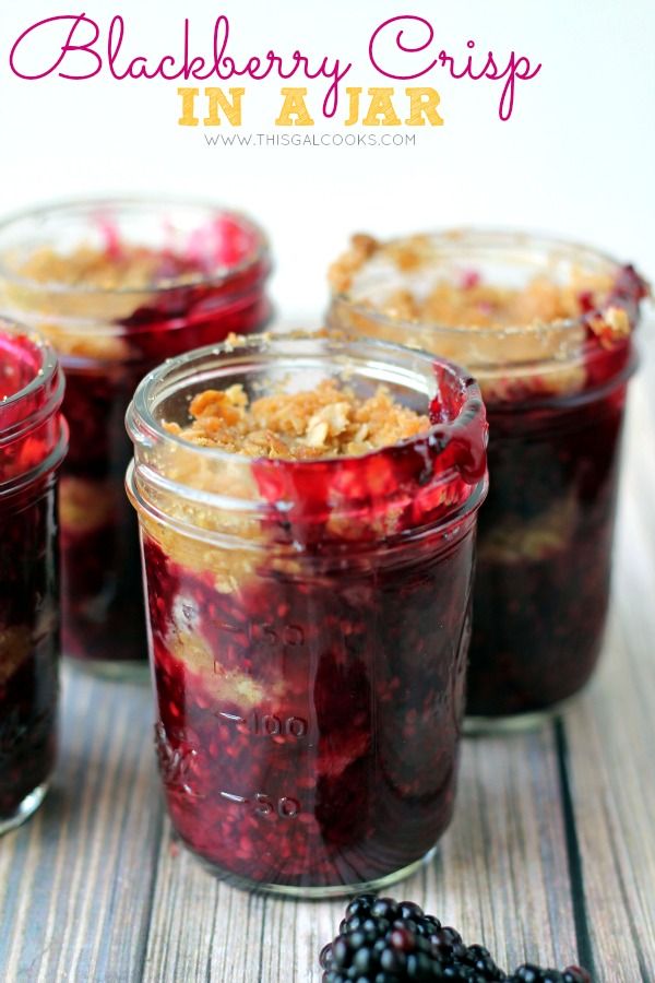 blackberry crisp in a jar with berries and blackberries