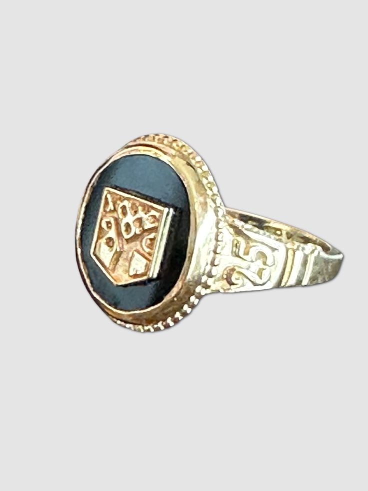 This ring is a traditional lasting symbol of hard work, friendships and milestones. This ring is classic in design that will be worn with pride for years to come. Our goal is to make class rings that are beautiful and represent the spirit of the school for which they are made. The black onyx stone provides a stricking backdrop to the 14k, 10k or SS shield that represents the school. Handmade and beautiful not just for the graduation season but for a lifetime. Onyx stone set in 14k, 10k or Sterli Gold Shield, Class Rings, Graduation Year, Black Onyx Stone, Onyx Stone, The School, Stone Settings, In Design, The Spirit