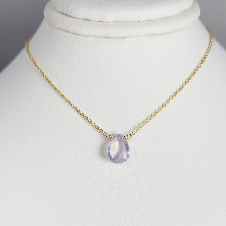 Add a touch of elegance with this handmade necklace, featuring a natural Lavender Quartz gemstone dangling in a handmade frame on a simple dainty chain. Choose your length for a choice to wear it as a choker or a long layered necklace. Simple, minimal, and elegant all-in-one necklace. Makes a great gift to add to any gemstone lover's collection. Perfect to gift for Christmas, Valentine's Day, Mother's Day, and more! Gemstone: Lavender Quartz, Scorolite Gemstone Size: 10.0 mm Gemstone Shape: Pan, Dainty Teardrop Pendant Necklace With Natural Stones, Elegant Amethyst Jewelry With Adjustable Chain, Elegant Purple Necklace With Delicate Chain, Delicate Everyday Gemstone Necklaces, Handmade Delicate Necklace With Teardrop Pendant, Delicate Gemstone Necklaces For Everyday, Fine Jewelry Handmade Teardrop Necklace, Elegant Drop Necklace With Briolette Natural Stones, Delicate Everyday Gemstone Necklace