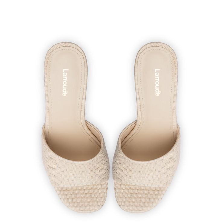 With retro vibes straight out of the 70s, we scream for these amazing new neutral—and beach-ready—mules that are going to be in seriously heavy rotation. Set on a considered platform base to ensure all-day comfort, the raffia is the one we've been waiting for. Product Details: Natural Beach Raffia Fabric Open round toe 4.5 inch block heel 1.5 inch platform Finely crafted leather sole for support, durability, and comfort Insole with memory foam cushion and hot stamp logo Peel off the protector be Hot Stamp, Stamp Logo, Jennifer Fisher, Beach Ready, Boot Pumps, Chunky Platform, Pumps Flat, The 70s, Handmade Shoes