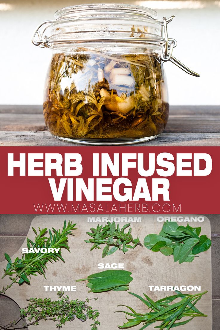 herbs in a jar with text overlay that says herb infused vinegar