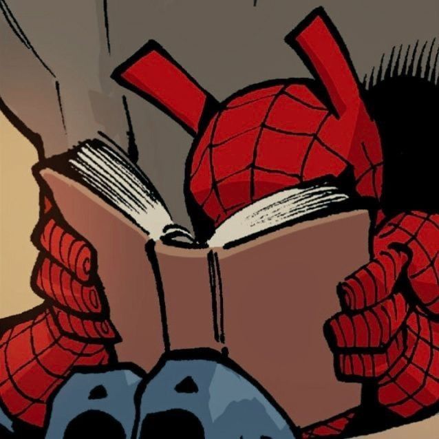 the spider - man is reading a book with his hands