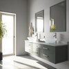 a bathroom with double sinks and large mirrors on the wall next to an open door