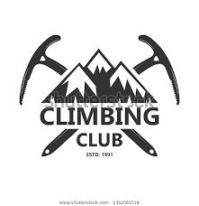 the emblem for climbing club with two crossed axes and mountains in the background, black and white