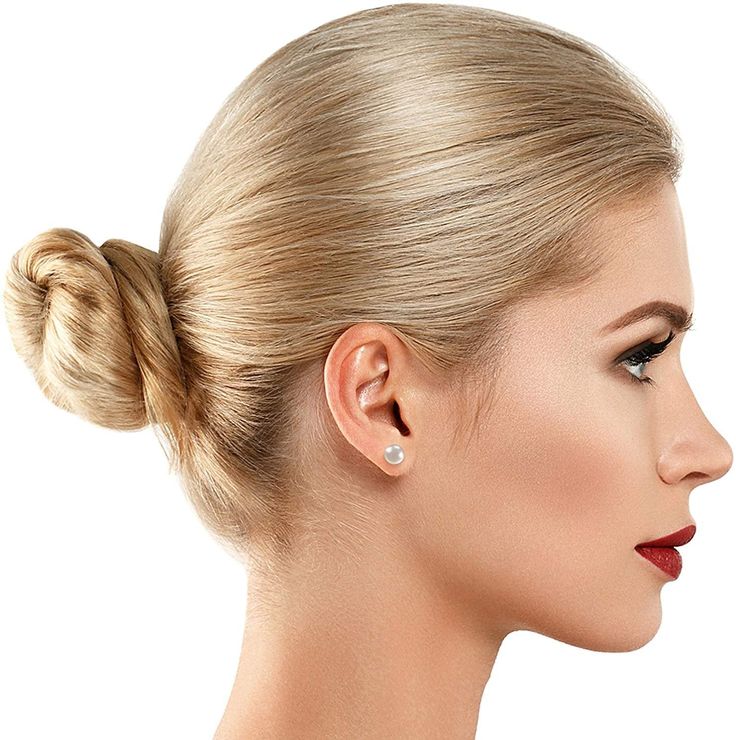 a woman with blonde hair in a bun