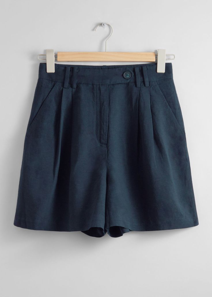 Tailored shorts finished with duo slash pockets.��• Belt loops• Welt pockets at the back• Length of inseam:10cm / 3.9" (EU 36 / UK 8 / US 4) High Waist Shorts With Side Pockets For Work, Blue Shorts With Side Pockets, High Waist Shorts With Hip Pockets For Workwear, Blue High Waist Shorts With Side Pockets, Relaxed Fit Bermuda Shorts With Welt Pockets, Workwear Shorts With Hip Pockets For Spring, Relaxed Fit High Waist Shorts With Welt Pockets, High Waist Relaxed Fit Shorts With Welt Pockets, Relaxed Fit Shorts With Belt Loops