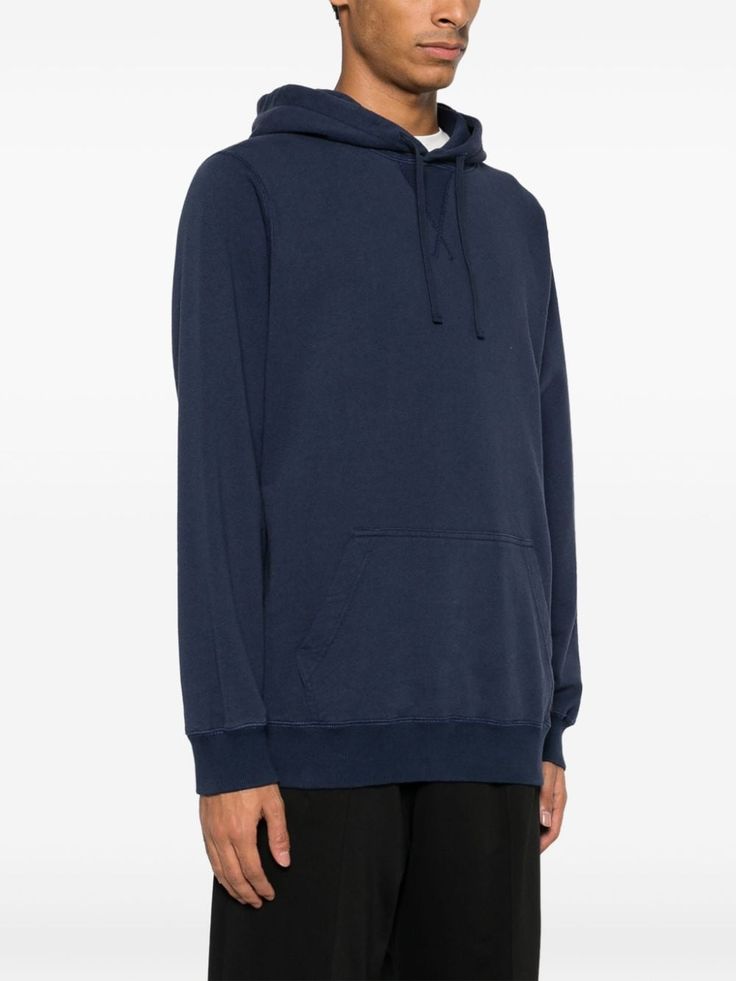 Classic cotton hoodie from GRAMICCI featuring jersey texture, drawstring hood, drop shoulder, front pouch pocket, ribbed cuffs and hem, French terry lining, navy blue, cotton and long sleeves.This piece fits true to size. We recommend you get your regular sizeModel is 1,84m / 6ft 1in wearing size M Navy Sporty Sweatshirt With Pockets, Navy Hoodie With Ribbed Cuffs, Navy Hooded Hoodie With Ribbed Cuffs, Navy Hoodie With Drawstring Hood, Navy Hooded Hoodie With Pockets, Navy Hooded Sweatshirt With Pockets, Navy Sporty Hoodie With Kangaroo Pocket, Navy Casual Hoodie With Pockets, Navy Cotton Hoodie With Ribbed Cuffs