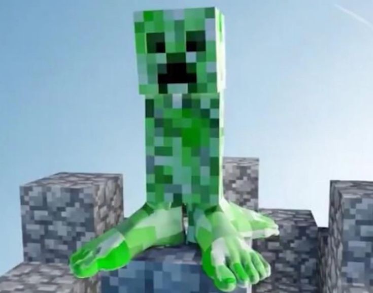 an animated image of a green monster standing on top of some blocks with his arms stretched out