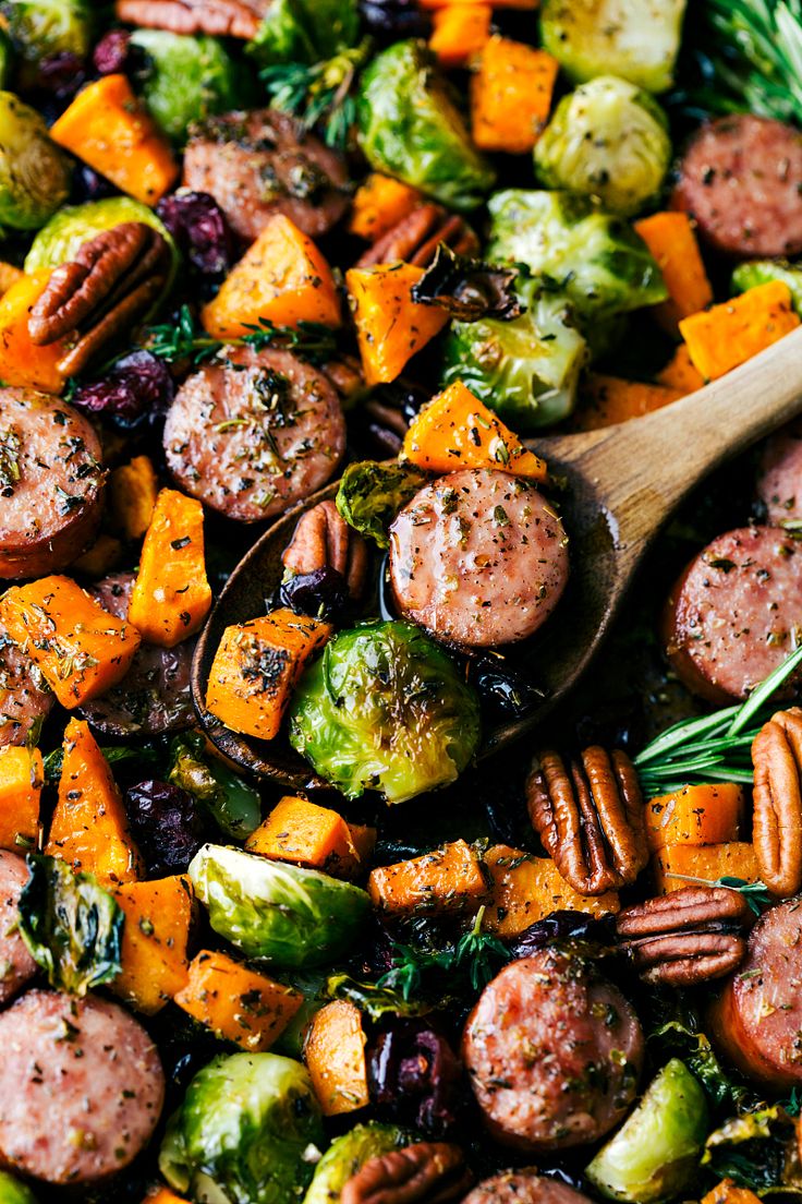 sausages, brussel sprouts and brussels sprouts in a skillet