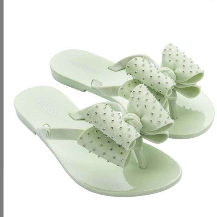 Mini Melissa New Playful Plastic Sandals For Spring, Playful Synthetic Jelly Sandals For Beach, Playful Synthetic Flip Flops For Summer, Playful Green Open Toe Sandals, Cute Green Open Toe Sandals, Green Open Toe Playful Sandals, Playful Synthetic Jelly Sandals For Summer, Adjustable Flat Synthetic Jelly Sandals, Adjustable Flat Jelly Sandals In Synthetic Material