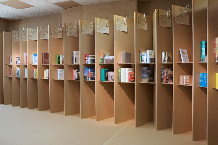 a row of bookshelves filled with lots of books