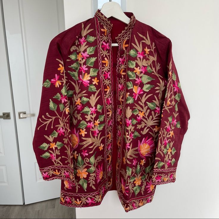 Never Worn. Fits Nicely Sizes Small And Medium. Fall Embroidered Long Sleeve Cardigan, Long Sleeve Outerwear With Floral Embroidery For Fall, Festive Long Sleeve Outerwear For Spring, Floral Embroidered Outerwear For Fall Festivals, Traditional Embroidered Fall Outerwear, Fitted Red Embroidered Outerwear, Traditional Embroidered Outerwear For Fall, Festive Fall Outerwear With Embroidery, Casual Red Embroidered Outerwear