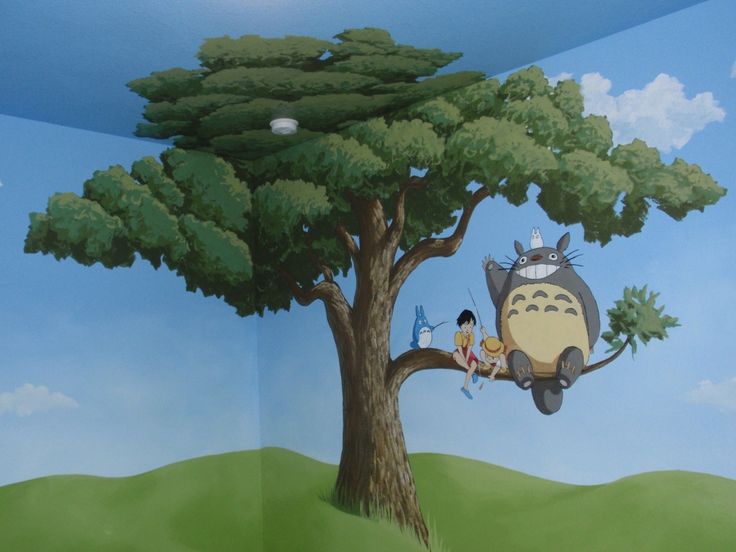 the wall mural in this children's room is painted with cartoon characters