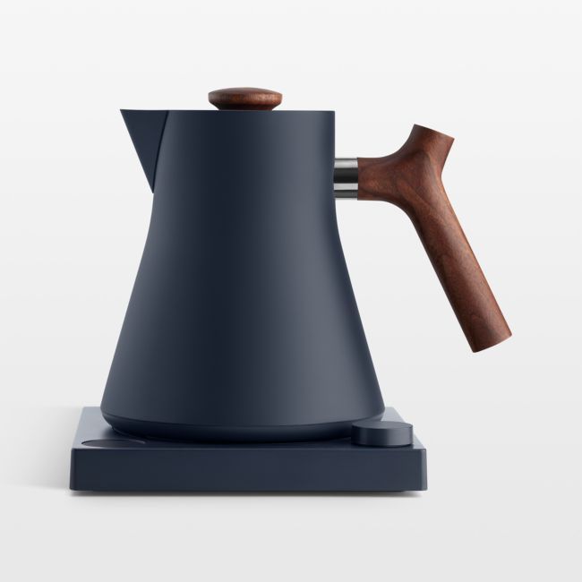 a black coffee pot with a wooden handle