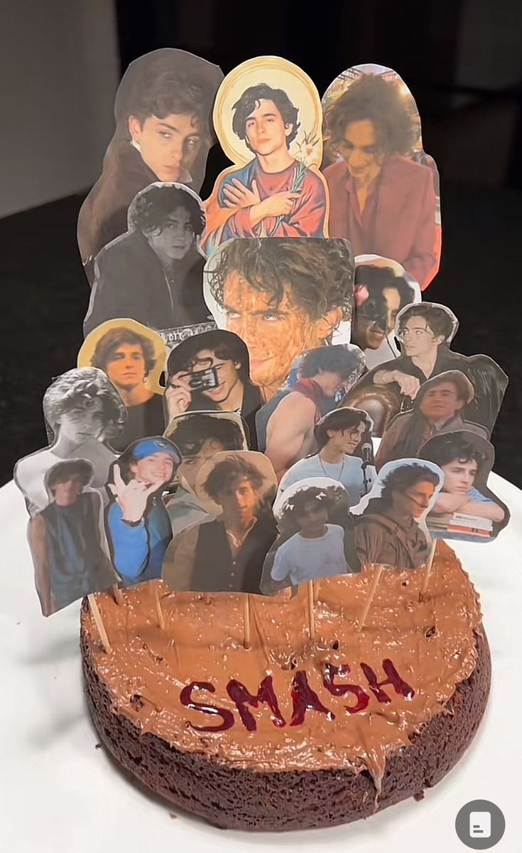 there is a cake with many pictures on it