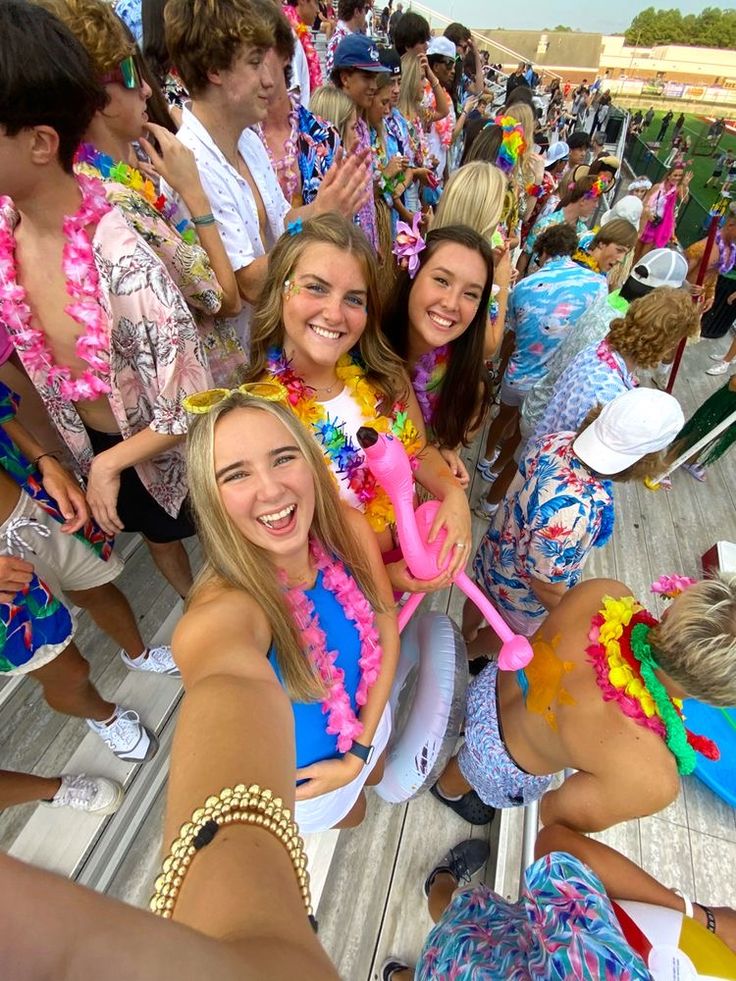 a group of young women standing next to each other