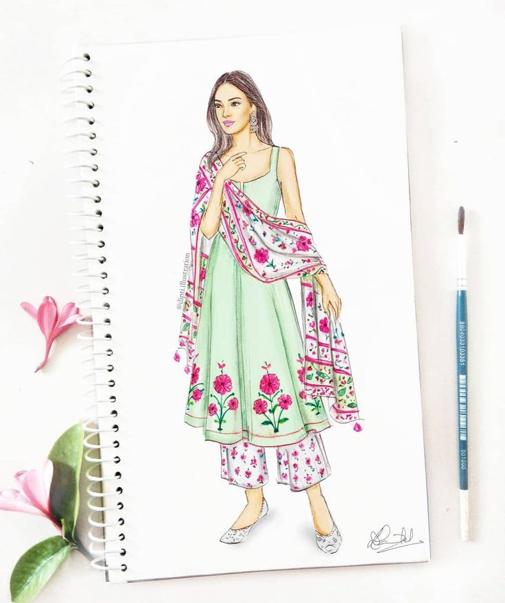 a drawing of a woman wearing a green dress with pink flowers on it and a pen next to it