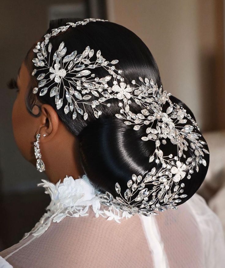 a woman wearing a bridal hair piece