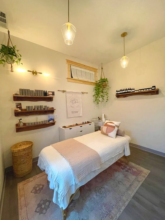 a room with a bed and shelves on the wall, plants hanging from the ceiling