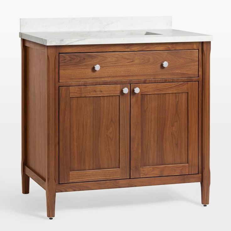 a bathroom vanity with two sinks and a faucet in the middle, on a white background