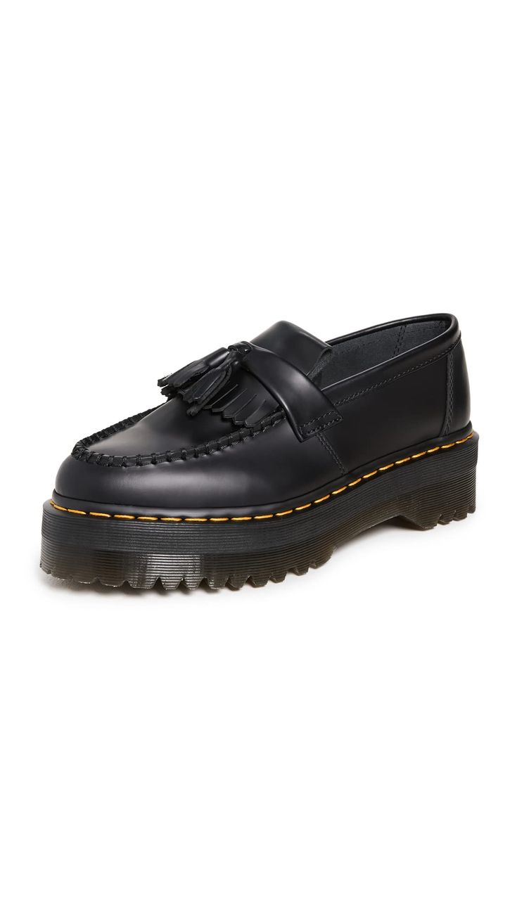 PRICES MAY VARY. Non-slip PVC AirWair sole Matte finish, Contrast welt stitching Heel: 2in / 50mm, Platform: 1.5in / 40mm Lace-up closure Round toe A little polished and a little edgy, these Dr. Martens loafers feature a traditional upper in smooth black leather, plus an air-cushioned platform sole that's embellished with the label's trademark yellow stitching. Doc Martens Loafers, Martens Loafers, Dr Martens Loafers, Dr Martens Adrian, Jadon Boots, Dr Martens Womens, Platform Loafers, Goodyear Welt, Derby Shoes