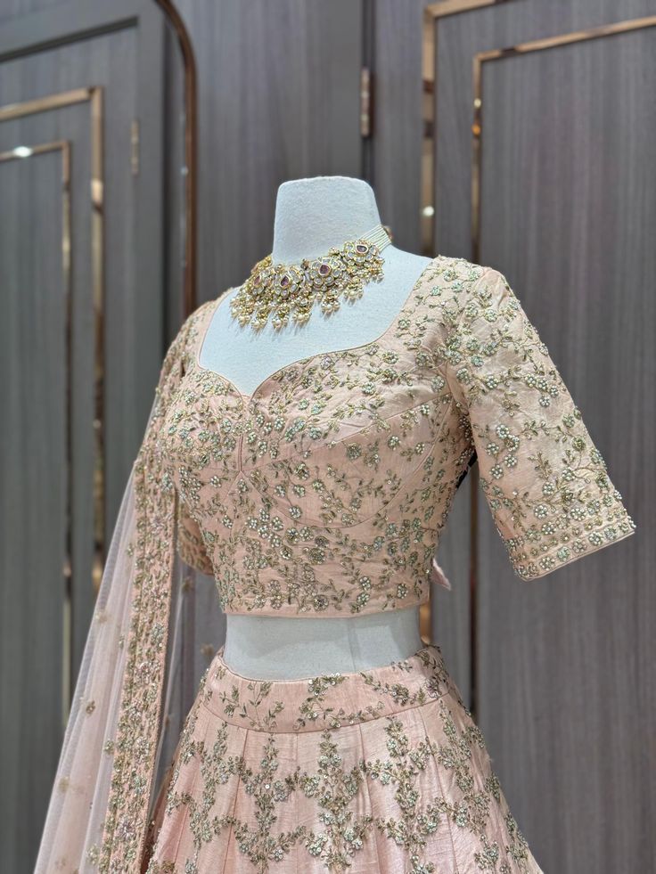 Indulge in luxury with our Bridal Lehenga BL-282. This exquisite peach lehenga is expertly adorned with delicate thread work, making it perfect for your special day. Elevate your wedding ceremony with this elegant and sophisticated piece that exudes artistry and refined taste. Peach Lehenga, Thread Work, Bridal Lehenga, Your Special, Lehenga, Special Day, Wedding Ceremony, Thread