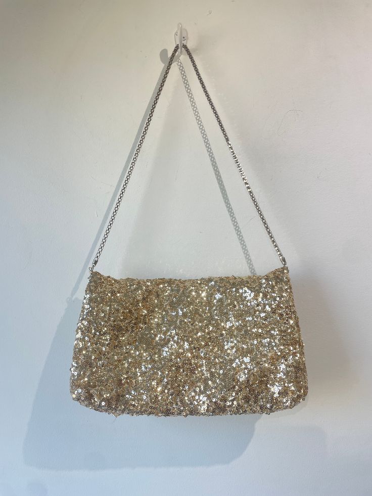 Betsey Johnson Sequins Bow Bag. Great condition, perfect party purse!Approximate Measurements: Width: 12" Height: 6.5" Embellished Evening Shoulder Bag, Gold Sequined Bags For Party, Gold Sequined Party Bag, Gold Sequin Party Bag, Gold Party Bags With Sequins, Handheld Sequined Evening Bag For Parties, Luxury Evening Shoulder Bag With Sequins, Luxury Sequined Shoulder Bag For Evening, Luxury Evening Bags With Sequins