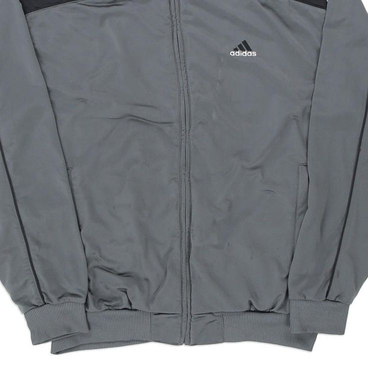 Description:Vintage grey Adidas track jacket, fits large.GENDER: mens CONDITION: good - stains on front and sleeves.STYLE: track jacketERA: 1990sCOLOUR: greyFABRIC: polyester Urban Gray Track Jacket For Streetwear, Gray Track Jacket For Streetwear In Fall, Gray Track Jacket For Fall Streetwear, Gray Sportswear Track Jacket For Fall, Gray Athleisure Track Jacket For Streetwear, Gray Long Sleeve Sportswear Track Jacket, Adidas Track Jacket, Sleeves Style, Jacket Fits