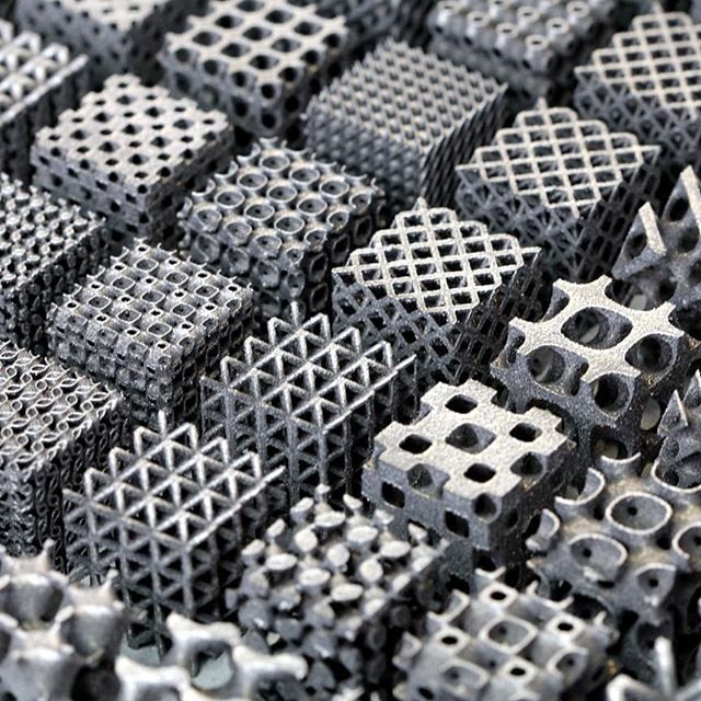 an intricately designed surface is shown in this close up photo, with black and white squares