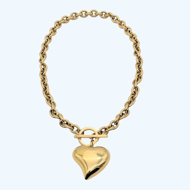 Curved Heart Pendant Statement Necklace with toggle clasp closure - "Add a touch of love to your wardrobe with this necklace! Featuring a unique curved heart pendant and a secure toggle clasp, you'll be sure to stand out in style. Say 'I heart fashion' with this playful and versatile accessory. (Warning: May cause uncontrollable amounts of heart eye emojis from your friends and admirers.)" Metal - 18k Goldplated for gold Silverplated for silver color Waterproof Chain length: 46 cm Heart Pendant Necklace With Chunky Chain, Chic Heart-shaped Metal Necklace, Chic Metal Heart Necklace, Chic Metal Necklace For Valentine's Day, Chic Metal Toggle Necklace For Gifts, Gold Heart Toggle Necklace With Toggle Clasp, Gold Heart-shaped Toggle Necklace, Heart Charm Toggle Necklace For Valentine's Day Gift, Valentine's Day Toggle Necklace With Heart Charm As Gift