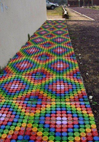 a multicolored walkway made out of plastic cups