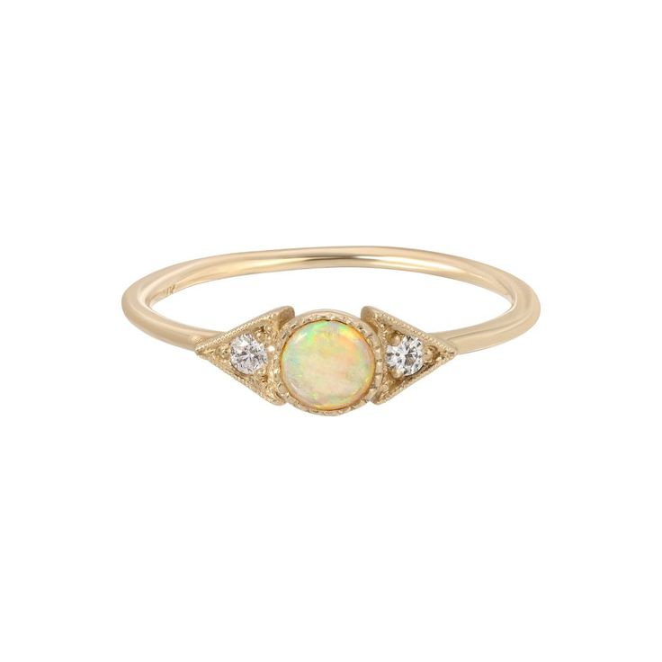 Our Opal Spear Ring features a soft Australian opal, but set in our Spear setting, this piece feels just a touch edgy.  We love the variety of color in opals and our signature milgrain texture gives this lovely piece just a hint of nostalgia. Details: - 4 mm Australian opal - two 1.8 mm diamonds - milgrain detail Avail Classic Ethiopian Opal Gemstone Rings, Elegant Ethiopian Opal Cabochon Rings, Heirloom Opal Cabochon Ring, Heirloom Cabochon Opal Ring, Heirloom Ethiopian Opal Round Ring, Fine Jewelry Opal And Moonstone Multi-stone Ring, Opal And Moonstone Multi-stone Fine Jewelry Ring, Formal Opal Rings With Gemstone Accents, Heirloom Multi-stone Opal Ring