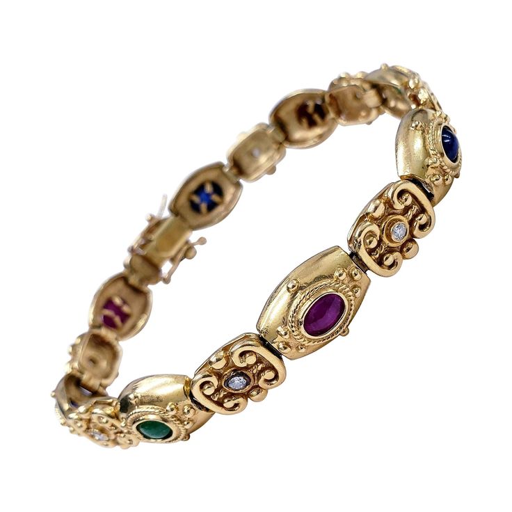 Antique Victorian cabochon bracelet featuring sapphires, emeralds, ruby's and a cats eye gem in 14k solid gold. This piece is luxurious and craftsmanship can be seen through out. The diamonds total carat weight is approx 0.35ct. This is truly a piece of history that can be worn! Slide Bracelet Charms, 1800s Jewelry, Vintage Diamond Bracelet, Cats Eye Gem, Victorian Antiques, Cabochon Bracelet, Victorian Bracelet, Cameo Bracelet, Diamonds Bracelet