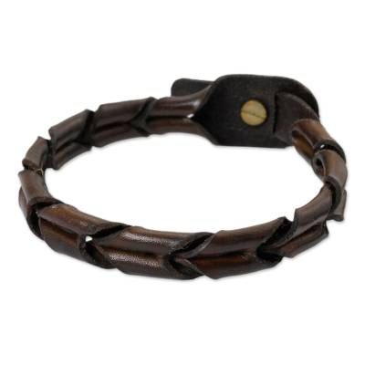 Sleek and handsome this wristband from Thailand is designed for men. Chaloemphon crafts the dark brown leather bracelet by hand creating a braided effect. Brown Leather Braided Bracelet As Gift, Adjustable Brown Leather Braided Bracelet, Brown Leather Strap Bracelet, Masculine Adjustable Braided Leather Bracelet, Masculine Adjustable Braided Bracelets With Leather Strap, Brown Leather Braided Bracelet, Brown Braided Leather Bracelets, Everyday Brown Bracelet, Adjustable Brown Leather Bracelet With Wrist Strap