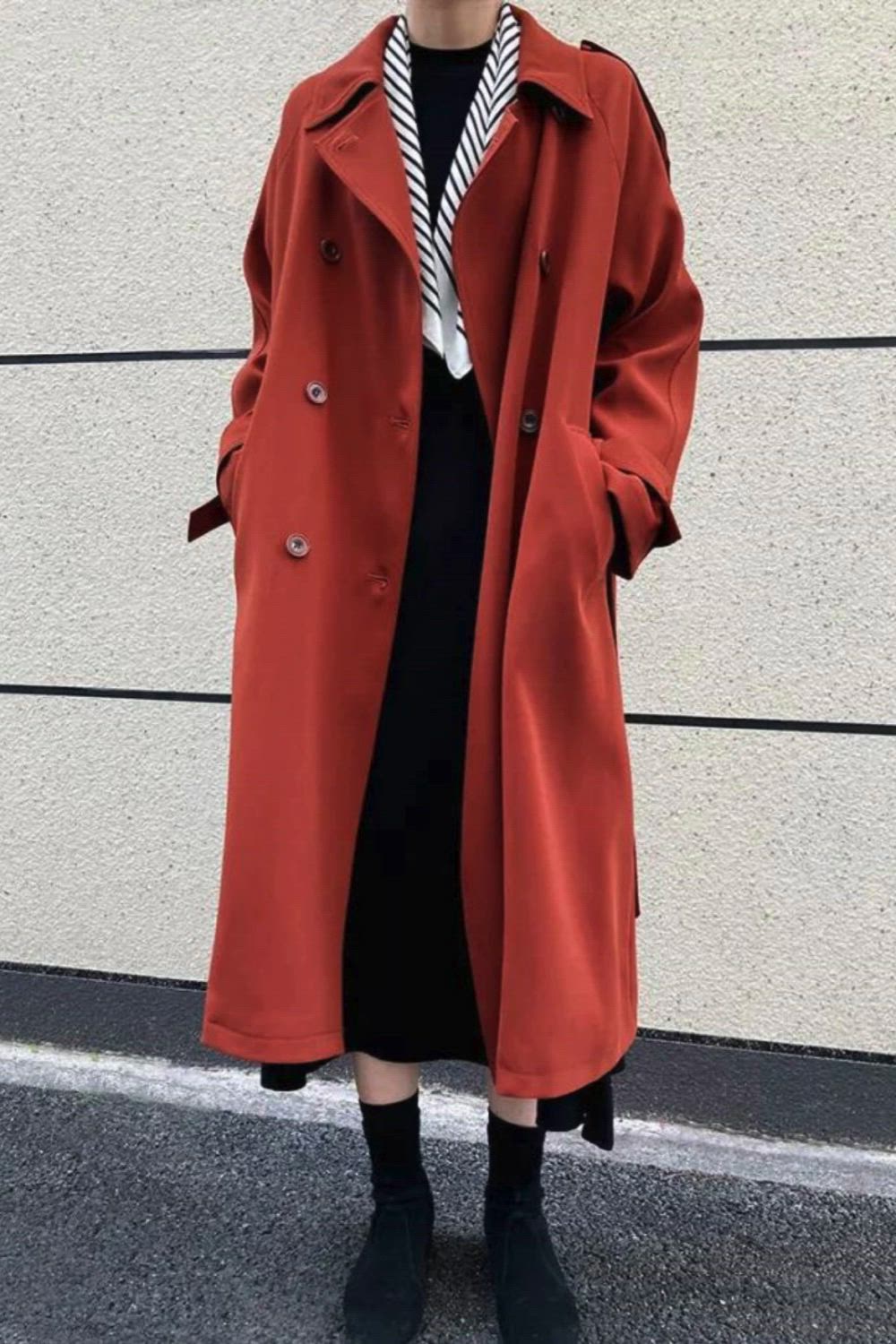 Elevate your outerwear collection with our British Style Loose Mid-length Trench Coat. Crafted with a timeless design and relaxed fit, this coat exudes effortless elegance. The mid-length silhouette offers versatility for various occasions, while the loose fit ensures comfort and ease of movement. Perfect for adding a touch of sophistication to your ensemble,