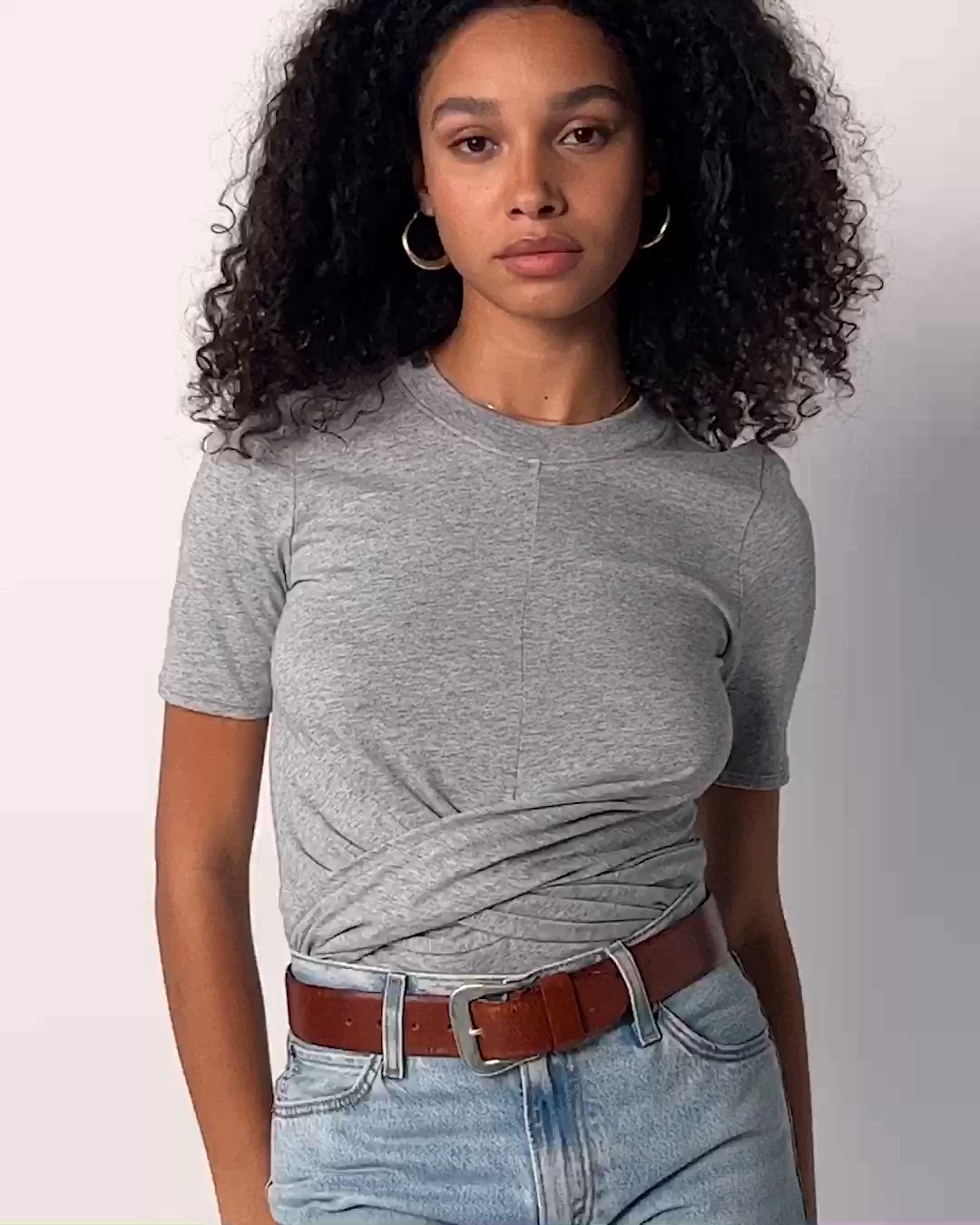 A classic crew neck tee with a chic twist. (It's the wrap front and ultra-flattering fit.) Pairs well with vintage jeans and compliments. (This one comes in Heather Grey.) | Women's Talia Tee Top in Heather Grey | Ethical Essentials