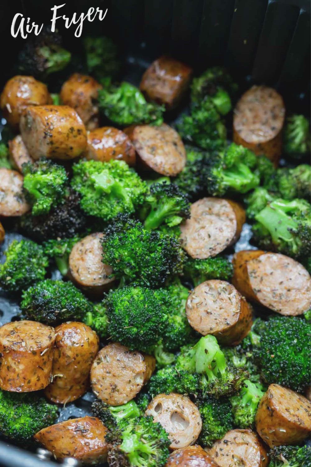 This may contain: broccoli and potatoes in a pan with the words air fryer written above them