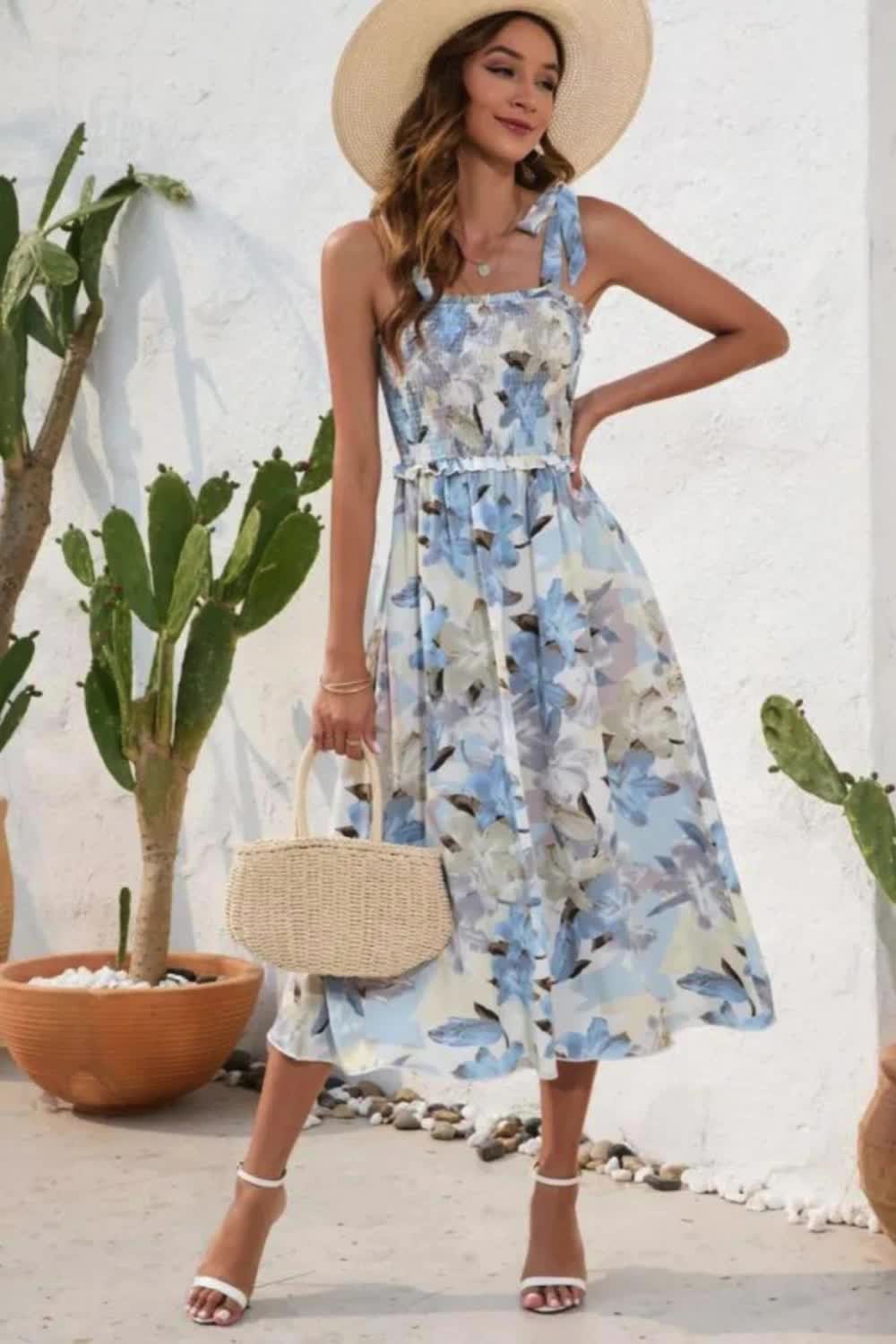 This smocked printed square neck midi dress is a blend of elegance and comfort. With its stylish print and flattering silhouette, it's perfect for any casual or semi-formal occasion.