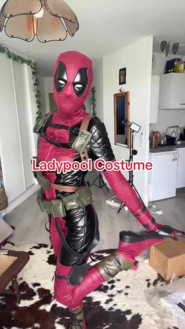 This contains: deadpool lady deadpool ladypool cosplay costume halloween women cosplay girl cosplay party event