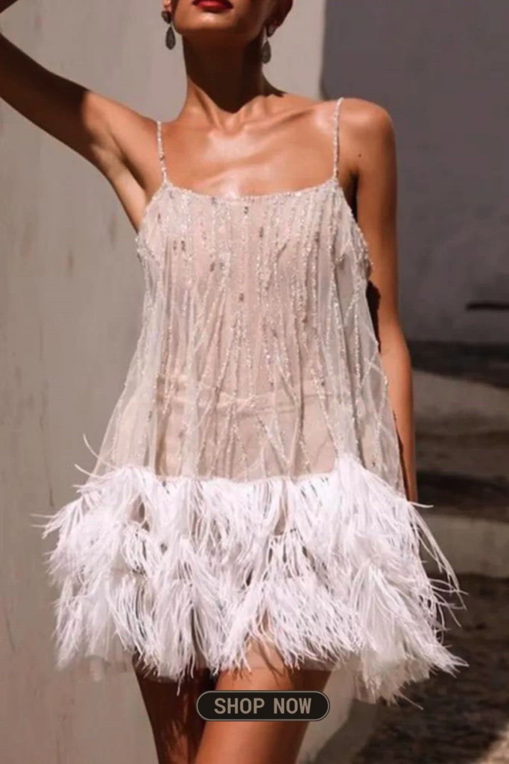 This sexy solid tassel mesh U-neck sling dress is a captivating ensemble that combines allure with a touch of bohemian flair. The mesh fabric, adorned with playful tassels, creates a sensual and chic look. Perfect for a night out, this dress effortlessly embraces bold style and feminine charm.