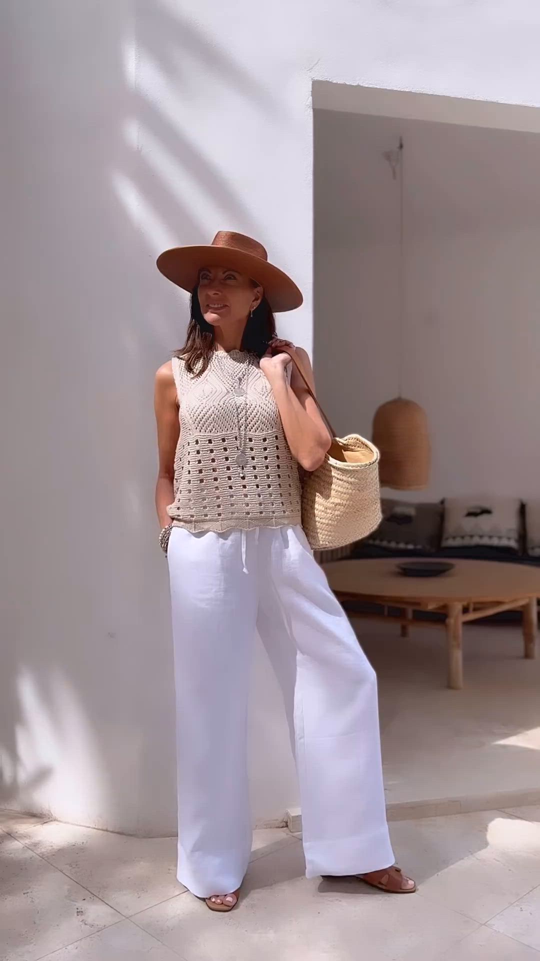 Embrace the summer vibe with the crafted elegance of BYPIAS's Adriel Crochet Top in Natural White. This timeless piece blends the beauty of crochet with the comfort of cotton, making it your perfect companion for sunny days, beach outings, or romantic summer evenings.