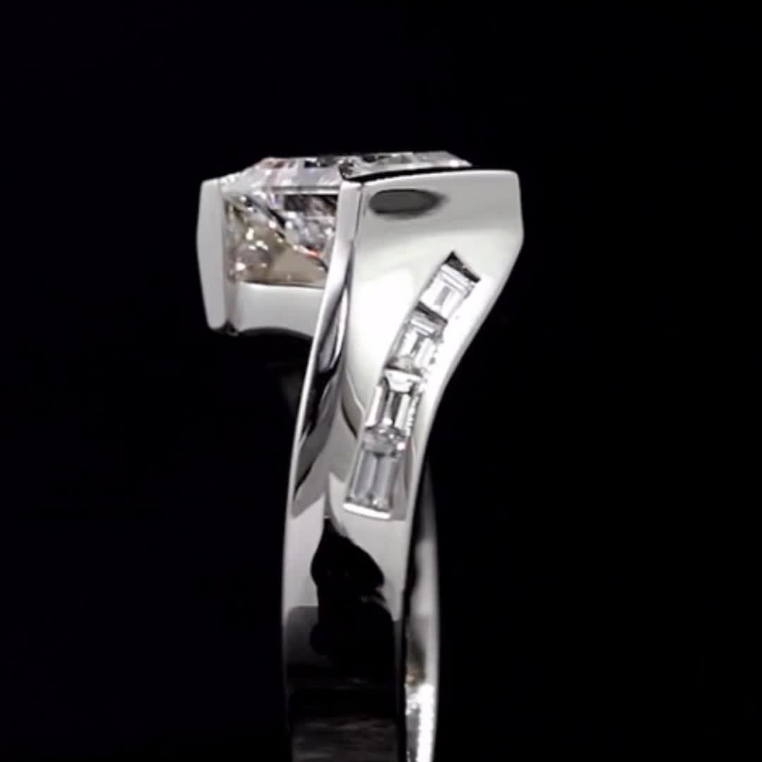 This may contain: a white gold ring with two diamonds on the top and bottom, set in 18k white gold