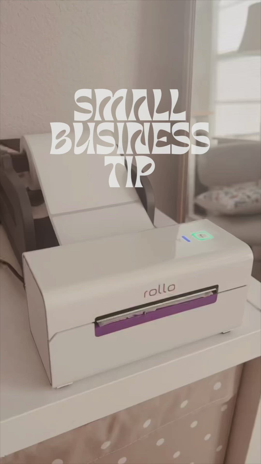 This may contain: a small business tip machine sitting on top of a desk next to a window with polka dots