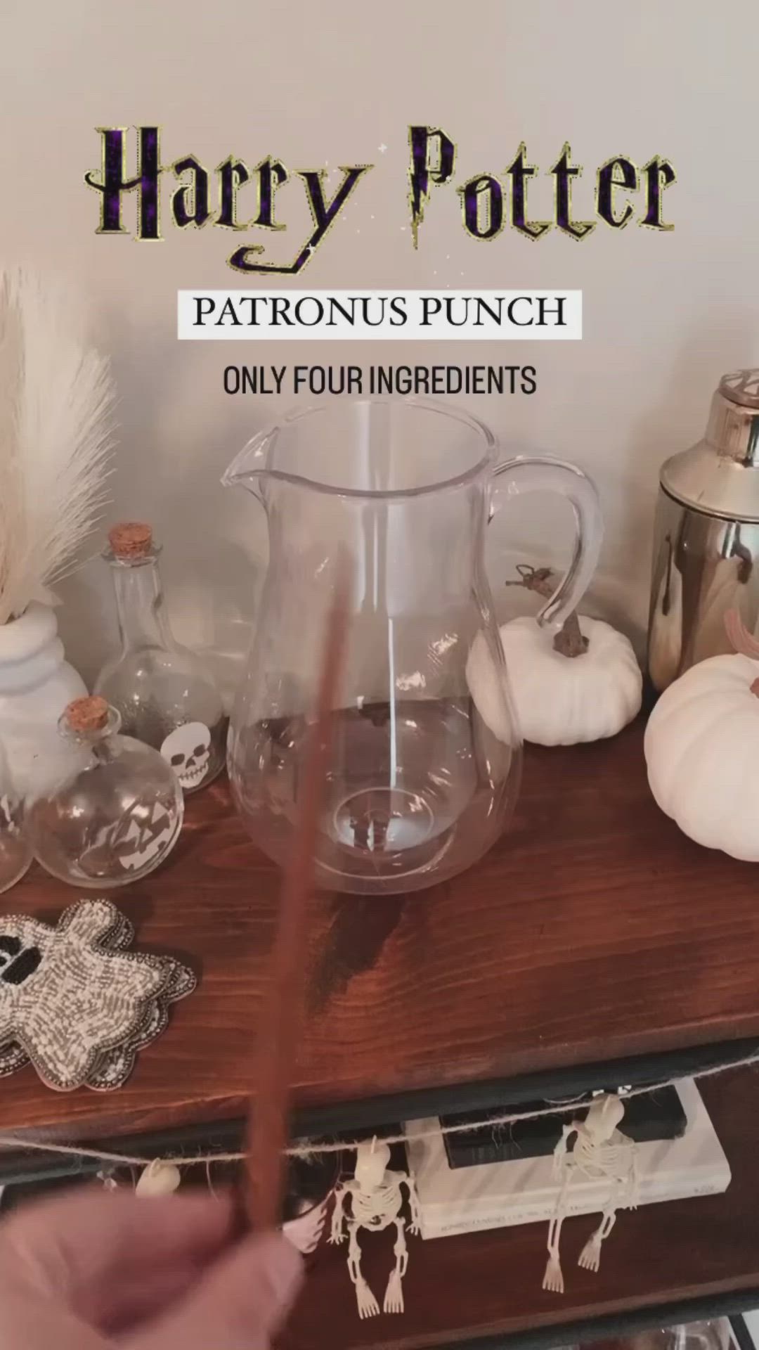 This may contain: harry potter patron's punch on a table with other harry potter items around it