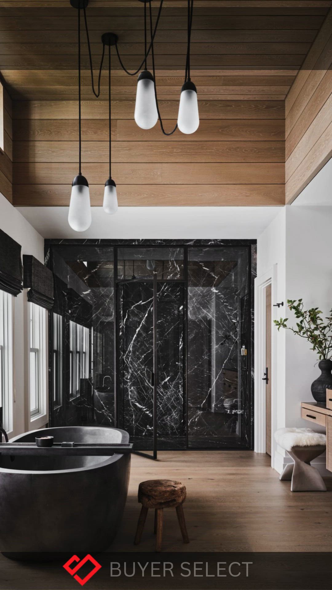 This may contain: a black bath tub sitting in the middle of a bathroom next to a wooden ceiling