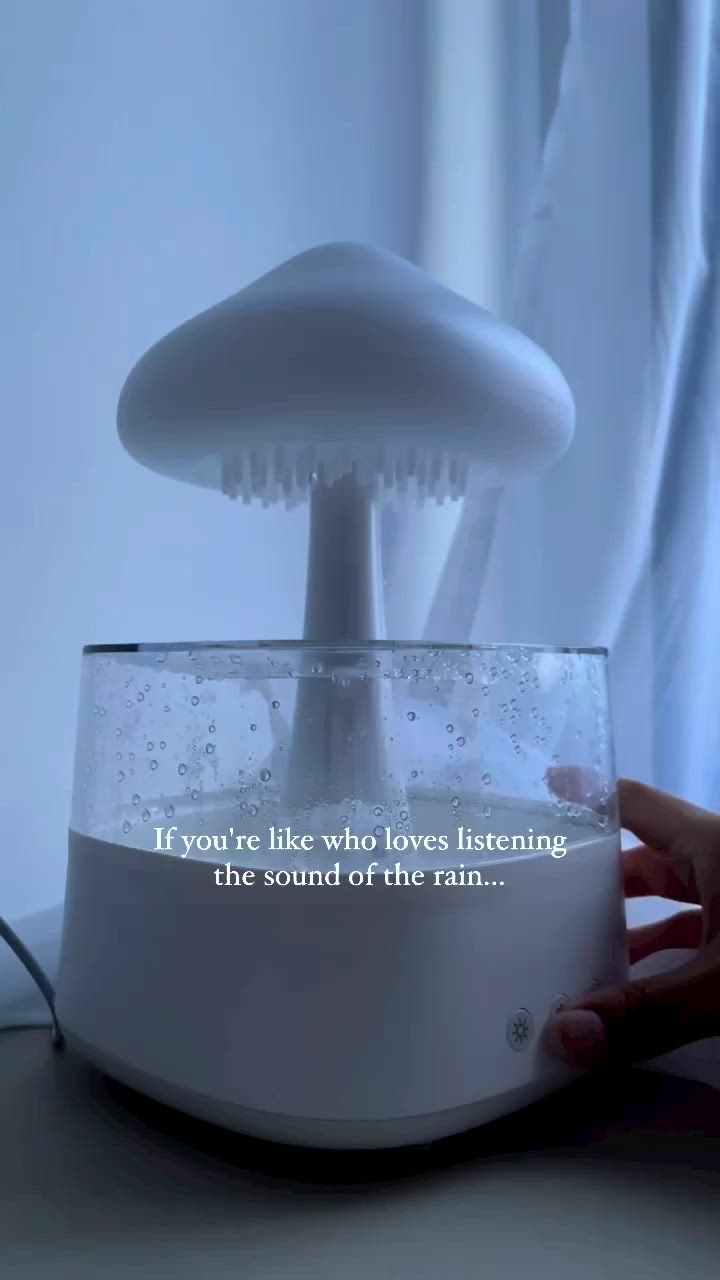 This may contain: a person holding a mushroom shaped object in front of a window with the words if you're like who loves listening, the sound of the rain